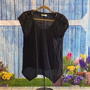 Cato - Lacey, lightweight black handkerchief blouse.